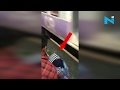 Shocking! Girl almost falls off speeding local, narrowly escapes death