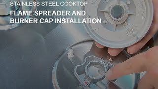 Flame Spreader and Burner Cap Installation on a Stainless Steel Cooktop