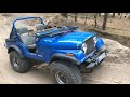 Jeep CJ5 AMC 360 V8 in the desert of Jänschwalde, Germany