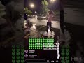 Baylen Levine and Lilah dancing in a puddle (TW: wholesome af)