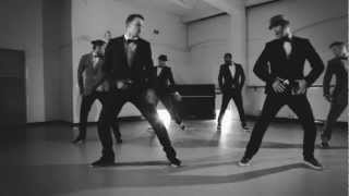 Justin Timberlake shows off his dance steps in monochrome outfit