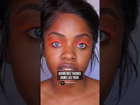 Une femme noire aux yeux blues