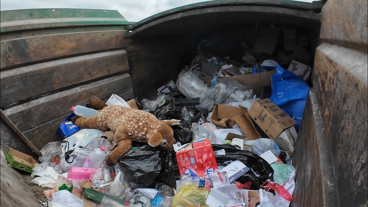 Waste Management front load commercial garbage truck 