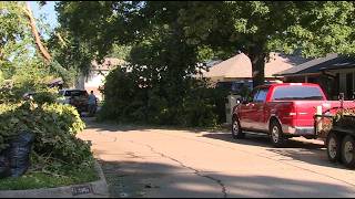 'It was like a maze': Norman neighborhood hit hard by storm works together to clean up