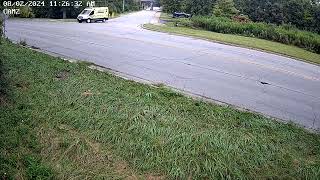 Near Miss-Semi honks in ResidentialArea at Ambulance “stuck” makingLHturn at skewd mislgned intrsctn