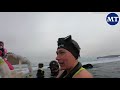 Russian Swimmer Claims World Record In Baikal Under-Ice Swim | The Moscow Times