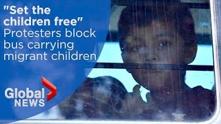 Emotional scenes as protesters block bus carrying immigrant children at Texas facility