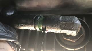 How to remove the Volvo semi truck transmission line from radiator coolant