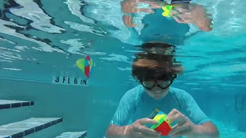 Solving Two Pyraminx Rubik’s Cubes UNDERWATER