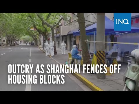 Outcry as Shanghai fences off housing blocks