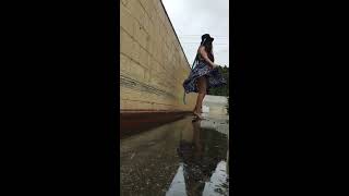 Gettin wet in the rain with my silk dress and high heels! SLO mo
