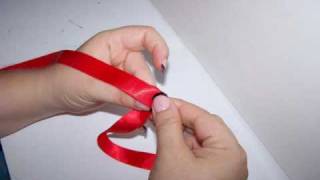 Easy Folded Ribbon Rose(How to make a simple folded ribbon rose. Practice with ribbon scraps and different styles to find your perfect rose. For more crafts visit: http://www., 2009-07-30T21:22:02.000Z)