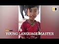 Cambodian boy masters 12 languages selling souvenirs to tourists