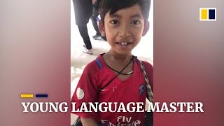 Cambodian boy masters 12 languages selling souvenirs to tourists