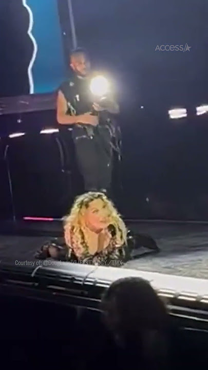 Madonna Falls Off Chair Onstage