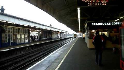 South West Trains Class 159 passing Wimbledon with tone
