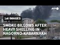 Smoke billows above Nagorno-Karabakh's main city Stepanakert after heavy shelling | AFP