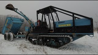 Homemade mini-tractor. Working tractor with excavator + trailer.