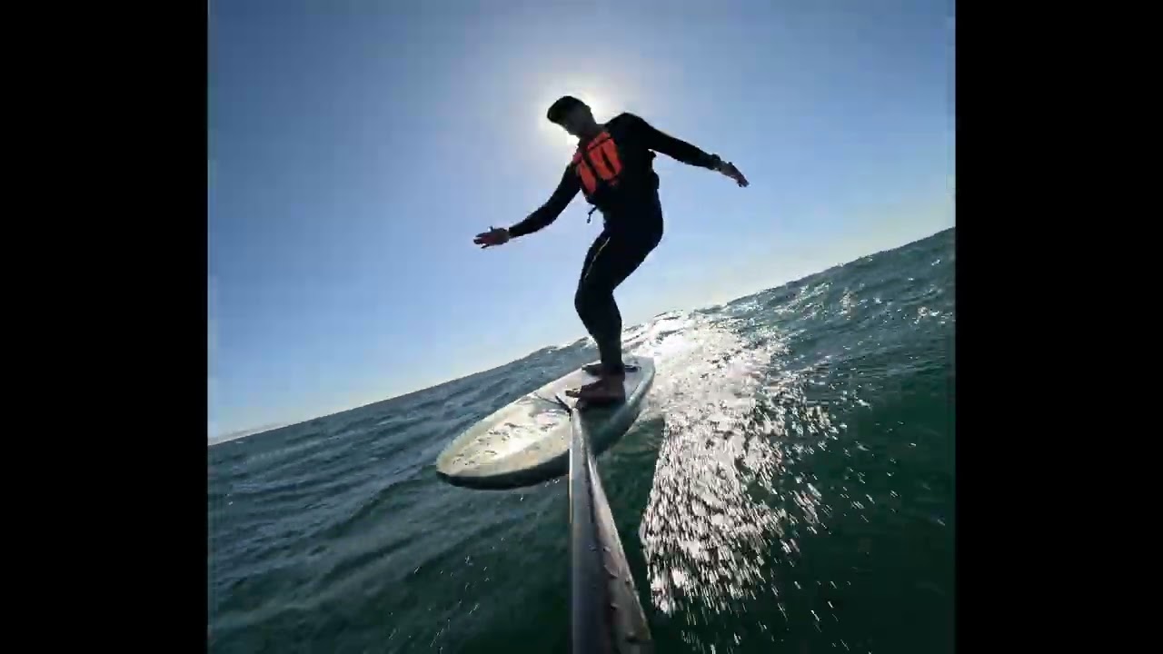 Surfing down the Central Coast on a Hydrocraft 7'4