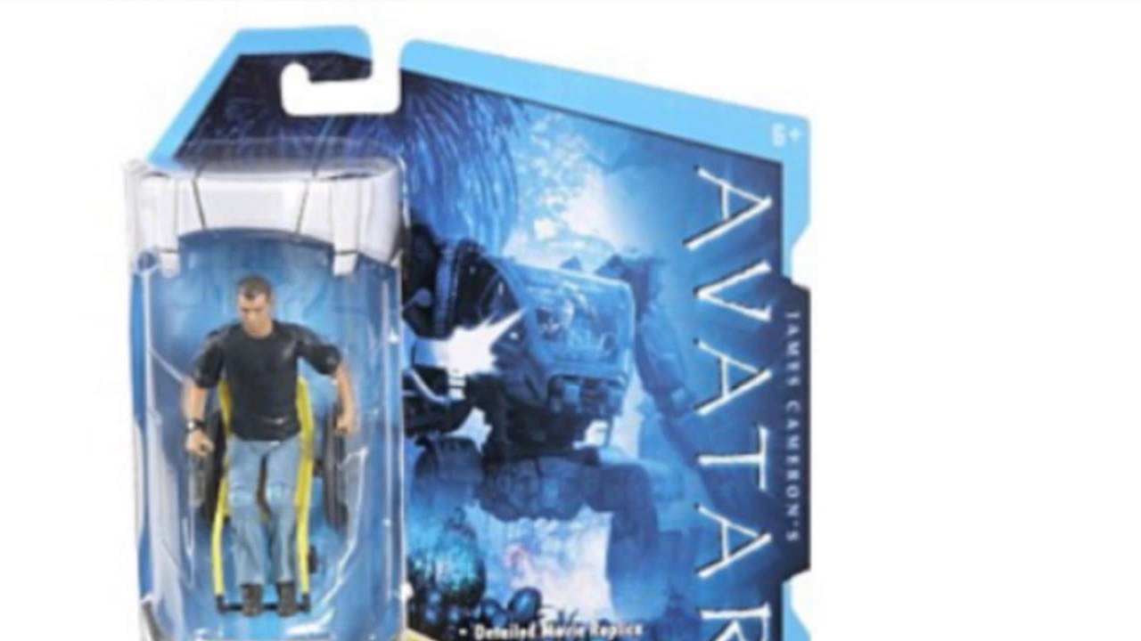 James Cameron's Avatar - Action Figure RDA Norm Spellman 9,5 Cm Con Arma E I-TAG Webcam - 3