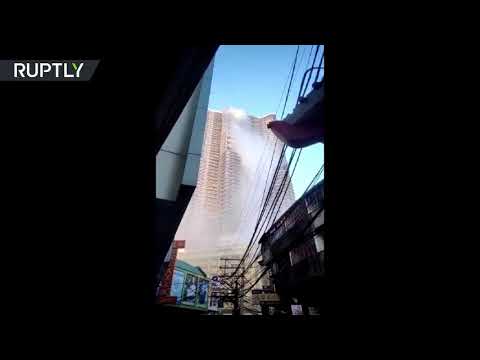 Water tank explodes on top of Manila’s skyscraper after 6.3-magnitude earthquake