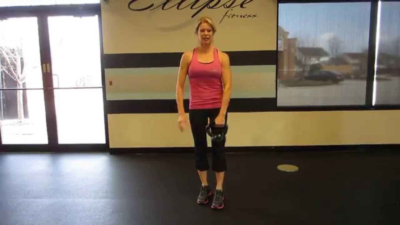 Kettlebell Step back lunge with kettlebell pass by Rebecc Blankfield