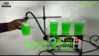 AUTOMATIC DIGITAL LIQUID FILLING MACHINE.