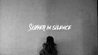 SUFFER IN SILENCE FT. GALLVS (OFFICIAL LYRIC VIDEO)