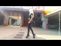 DANA LABO - the woman in black, laser shiny leggings and leather boots Pleaser, walk and dance