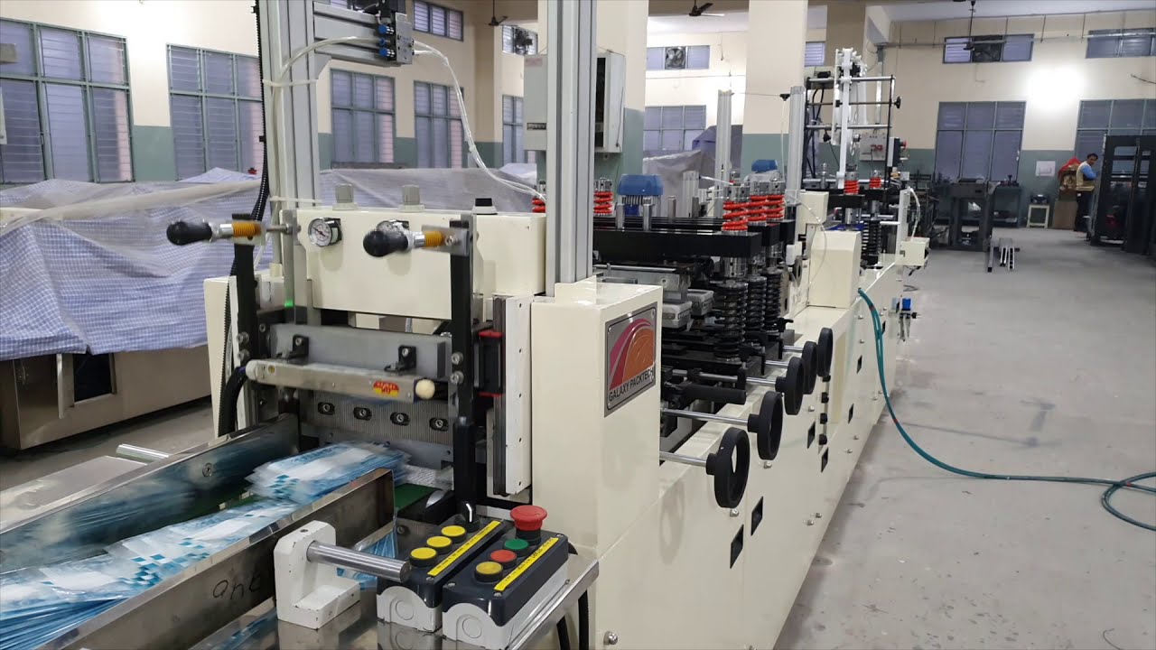 Automatic Center Strip Seal Medical Pouch Making Machine - GSC 10 PLUS