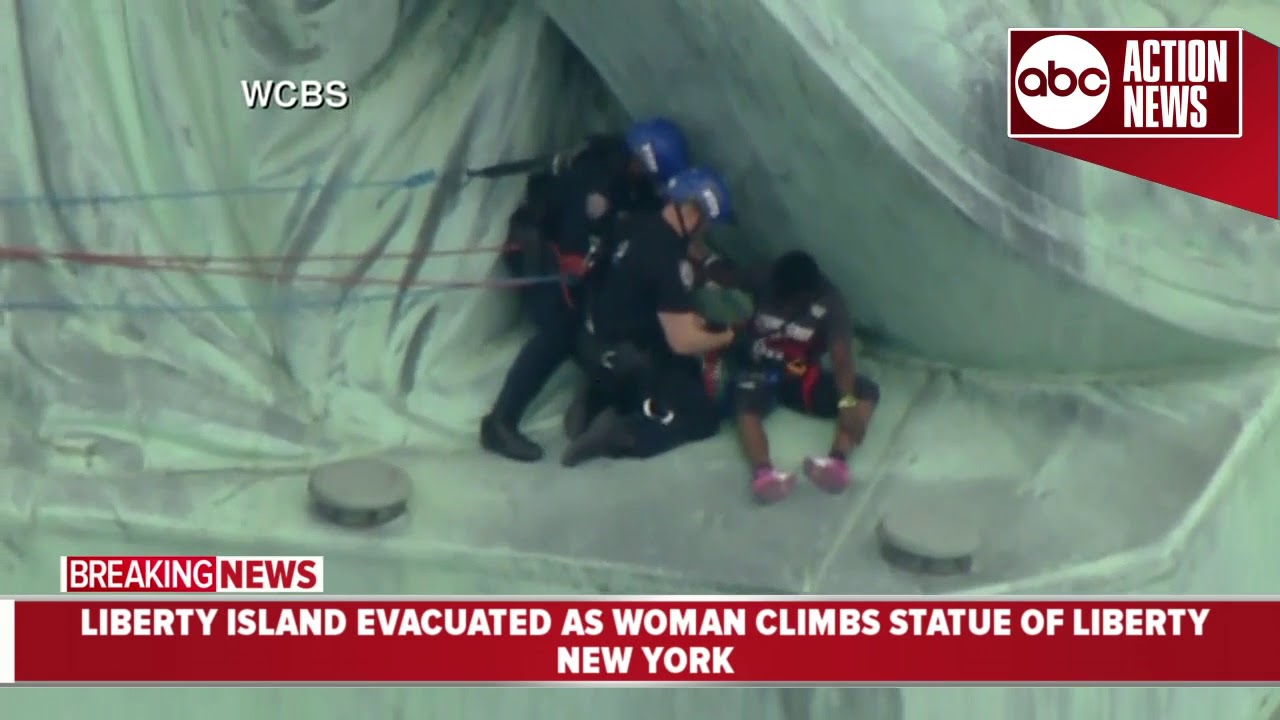 Woman apprehended for climbing up the Statue of Liberty on 4th of July ...