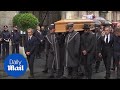 Lewis Hamilton escorts Niki Lauda's coffin at Vienna funeral