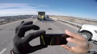 Full MoDOT maintenance workers filling potholes in the center lane of highway - very intense Update