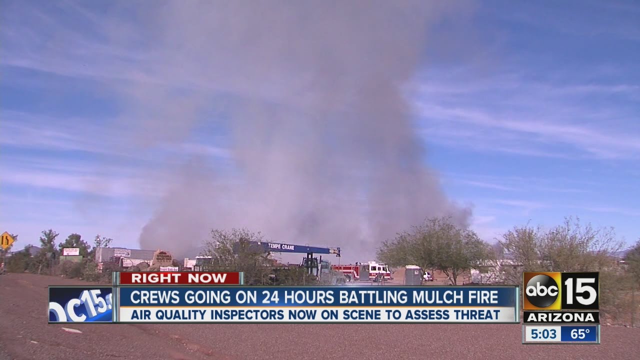 Crews going on 24 hours battling mulch fire - YouTube