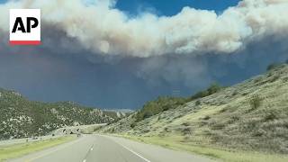 Wildfire burns through southern Utah pushed by strong winds also impeding firefighting efforts