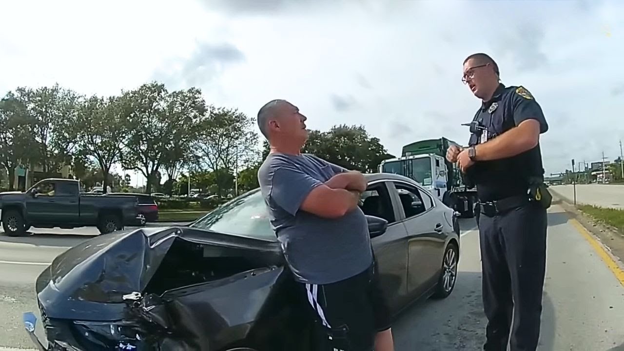 Man Causes Complete Chaos After Backing Into Police Car - YouTube
