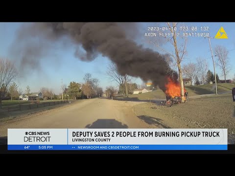 Livingston County sheriff's deputy rescues 2 people from burning vehicle