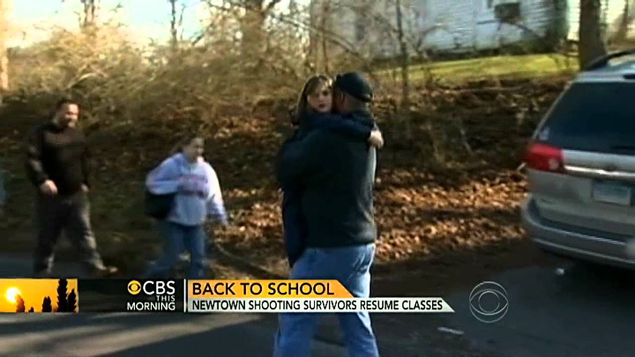 Newtown massacre survivors return to school
