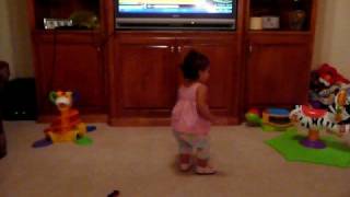 Natalie dancing to a commercial