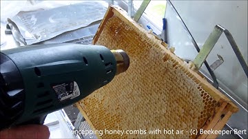 uncapping honey comb with hot air (c) APIS POWER Beekeeper Bert