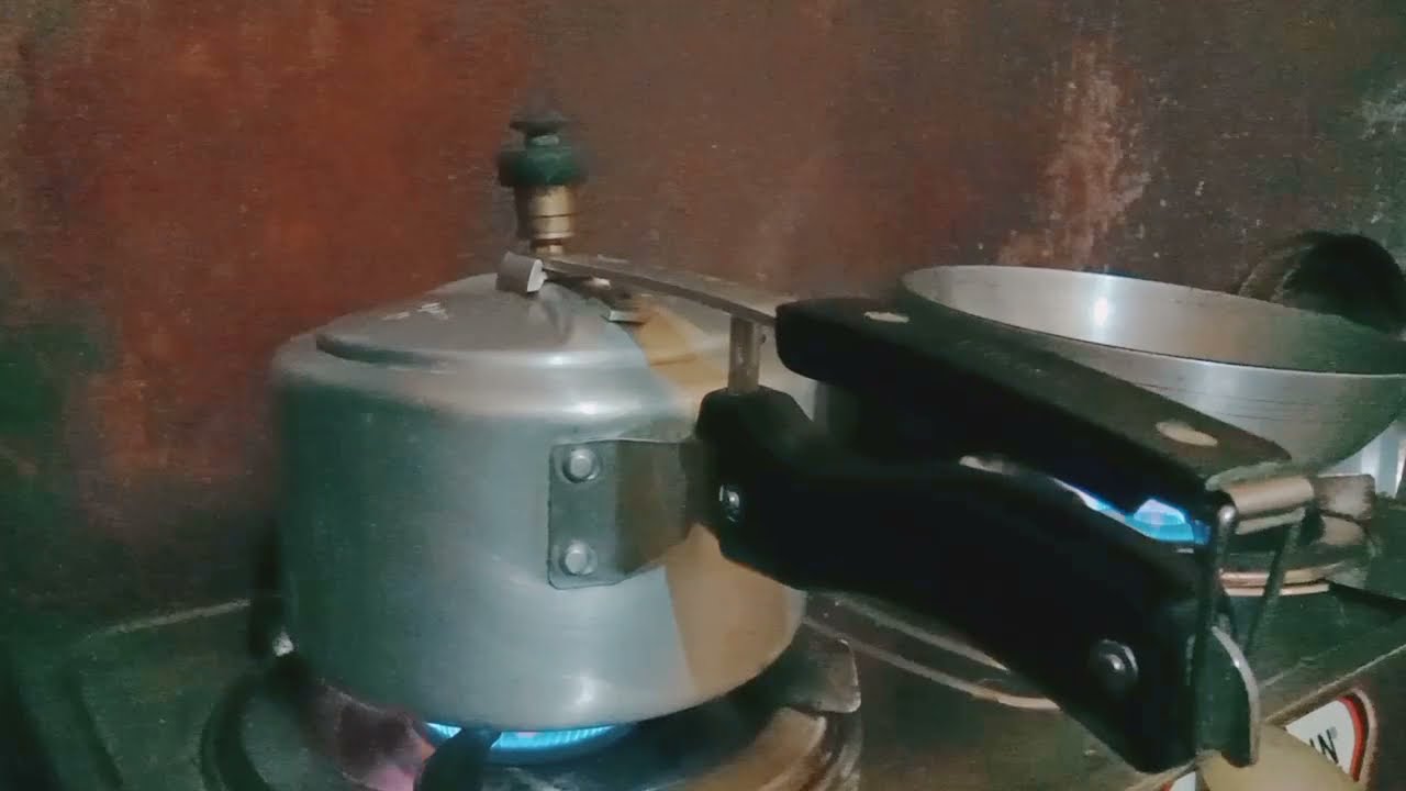potato boiling cooking with a pressure cooker pressure cooker whistle