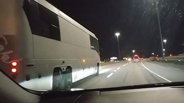 Getting passed by a white MCI J4500 Entertainer coach
