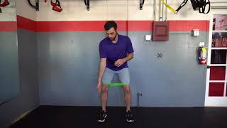 Mini Band Single Leg In and Out exercise demonstration by Dr. Brian Fischer