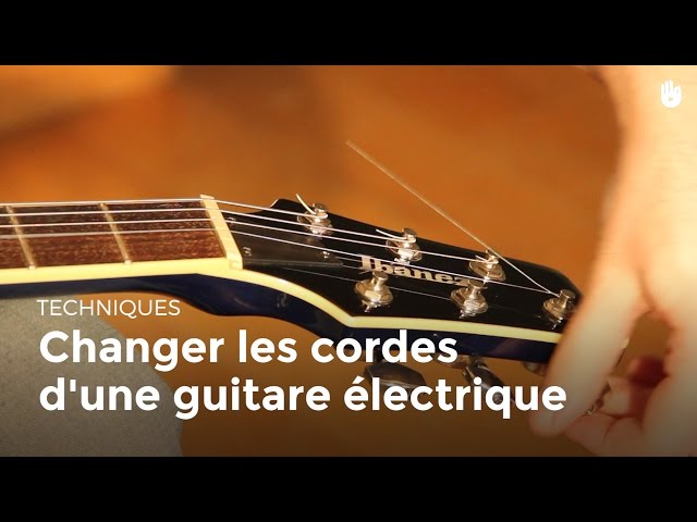 Changer les cordes d'une guitare électrique