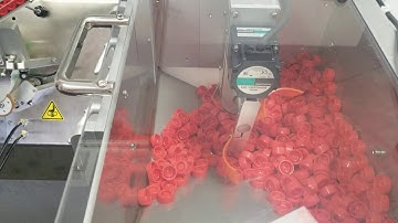 IQ TRX Bantam Tube Filler with Automatic Cap Sorting and Feeding Station