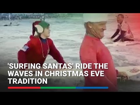 'Surfing Santas' ride the waves in Christmas Eve tradition | ABS-CBN News