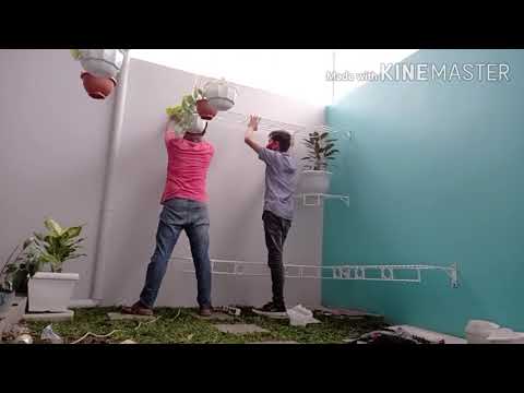 Video: Pot Dinding Untuk Bunga (23 Foto): Pilih Pot Bunga Gantung Di Dinding Dan Pasangkan Untuknya. Bagaimana Menggantung Periuk?