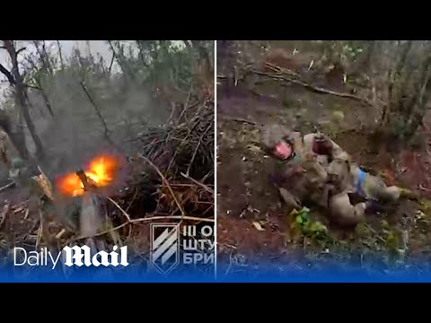 Wounded Ukrainian soldier fights on against Russians in assault on Russian trenches