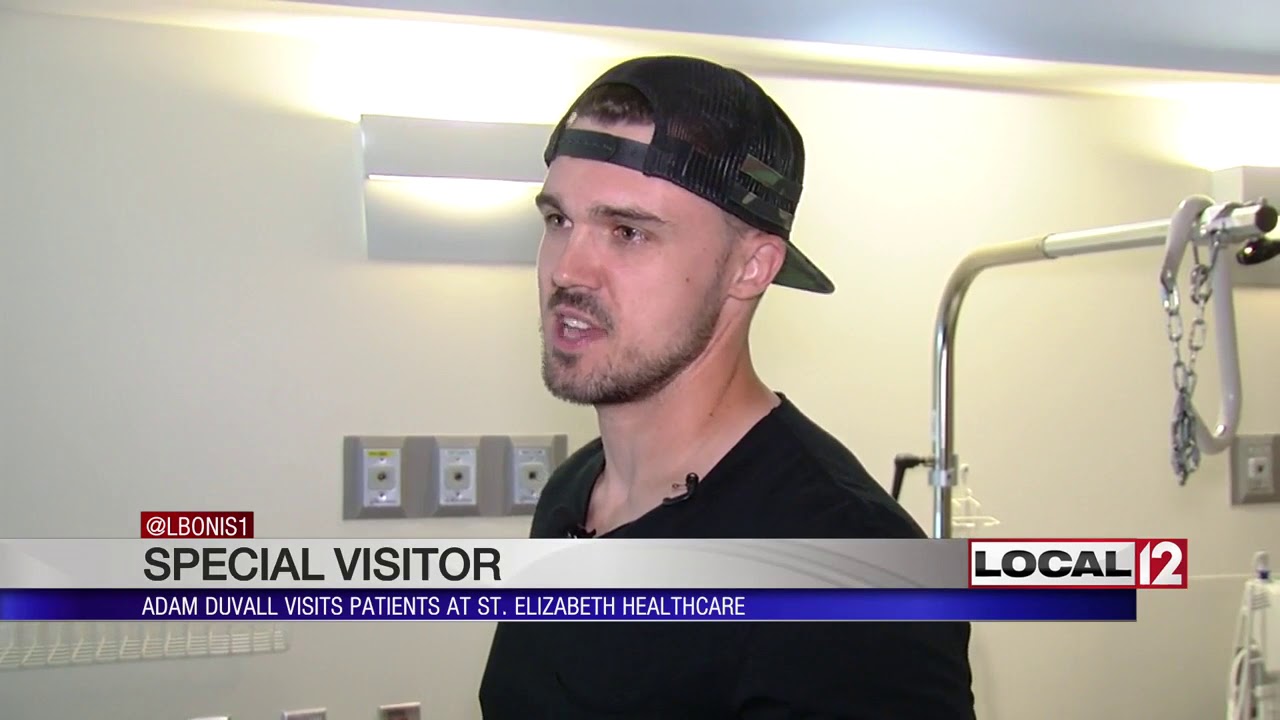 Reds' Adam Duvall visits patients at St. Elizabeth Healthcare 