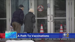 Pharmacies, Vaccination Sites Work To Keep COVID-19 Vaccine Appointments During Heavy Snow